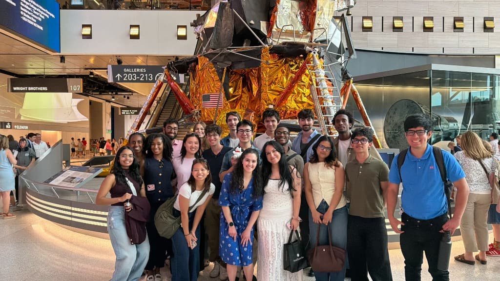 Open Quantum Initiative fellows visiting the Apollo lunar module exhibit during Chicago cohort field trip.